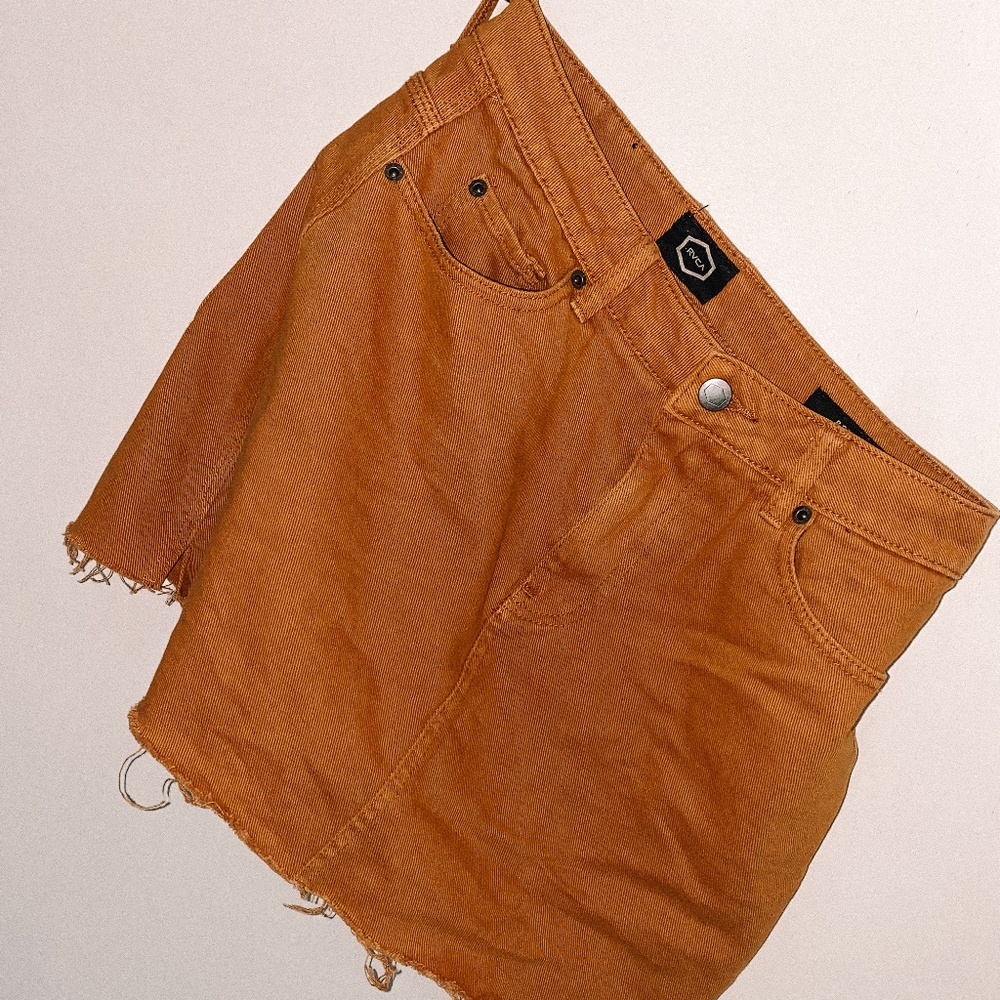 Orange denim skirt.